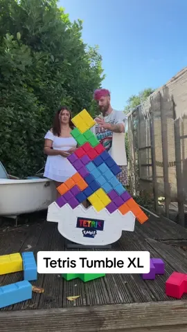 A post by @jakebsweet on TikTok caption: Tetris Tumble XL #Boardgames #ShauniandJake #Couple 