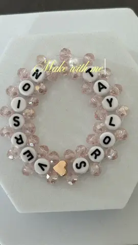 A post by @innava.jewelry on TikTok caption: Full bracelet Tutorial Taylors Version 💗 #tutorial #beads #smallbusiness #handmadejewelry #viral #fyp #friendshipbracelets #beadsjewelry #handmade #bracelettutorial #makethefriendshipbracelets #stepbystep #tylorswift #braceletmaking #diybracelet #erastour #ttpd #thetorturedpoetsdepartment #swiftie 