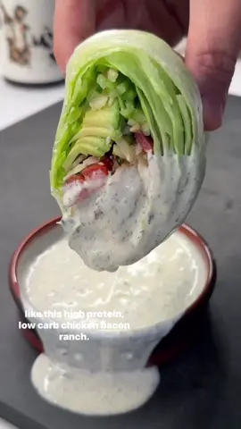 A post by @ketorecipes on TikTok caption: Just got back from Italy and Amsterdam and ate some of the best food of my life. No rules, just enjoying every bite. Now I’m home and easing back into meals that fuel me. I’ve lost 100 pounds over the years, and what’s helped most is finding meals that are simple, satisfying, and actually fun to eat. Like this Chicken Bacon Ranch Wrap 🥬🥓 For a fun twist, I added a layer of thin rice paper on the outside (think giant spring roll). If you’re super low carb or not feeling it, just use lettuce. Here’s how I made it: 1.Add 2 lbs chicken thighs to a bowl. Drizzle with 1 tbsp oil, a couple pinches salt, 1 tbsp smoked paprika, 1/2 tbsp garlic powder, 1/2 tbsp onion powder, 1/2 tbsp thyme, 1/4 tsp cayenne, 1/4 tsp cumin, and 1/2 tsp coriander. Mix well and let sit for 30 mins to come to room temp. 2.Grill, air fry, or pan-sear. I used a pan on medium heat for 3 mins, flipped, covered, and cooked for 6 more mins. Then turned off the heat and kept the lid on for 5 mins 3.Wash iceberg lettuce, shred cucumber, slice tomato and avocado, and chop chives. 4.Lay 8 oz bacon on a baking sheet and bake at 400°F for 20 mins or air fry. Cool on paper towels. I use 2 strips per wrap. 5.Mix 3 tbsp mayo, 3 tbsp sour cream, 1/3 cup buttermilk, 2 tbsp apple cider vinegar, juice of 1/2 lemon, 1/2 tbsp each dill, oregano, onion powder, 1/4 tbsp garlic powder, salt, and pepper. Taste and adjust. 6.Quickly dunk 3 thin rice paper sheets in warm water. Lay them out in a Venn diagram: 2 overlapping on the sides, 1 at the top. Add lettuce, 2 bacon slices, chicken, and veggies. 7.Fold the lettuce over the fillings, then fold the top rice paper sheet down. Tuck in the sides and roll it up burrito-style. 8. Add as much or little ranch as you like and enjoy. If you make it, let me know what you think on SHREDHAPPENS! #lowcarb #lowcarbrecipes #healthyrecipes #goodmoodfood #healthyfoodshare #ketorecipes