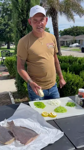 A post by @ralphthebaker on TikTok caption: Flounder stuffed with crawfish  shrimp and crab meat  ##bbq##cook##fish