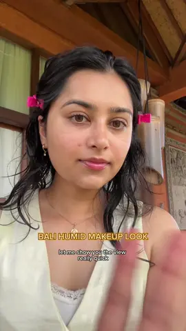 A post by @tanupaslife on TikTok caption: Humidity-proof natural makeup in Bali ☀️everything lasted all day 👇🏼@Glow Recipe hair clips  @DERMA E vitamin c oil  @SACHEU Beauty US gua sha  @KORRES 360 eyelift super serum @cocokind electrolyte moisturizer  @Caudalie vinosun protect  @ILIA Beauty skin rewind blurring foundation - 16n  @caliray beauty surf proof setting spray  @Ciele Cosmetics beauty blender  @milkmakeup jelly tint - chill  @caliray blush brush  @Tower 28 Beauty get set powder - translucent + one liner - color me fine  @Kosas powder puff + wet lip oil - Malibu  @HALEYS Beauty eyelash curler  Vest @madewell  Pants @UNIQLO USA  cami @Brandy Melville  #balimakeup #hotweathermakeup #humidityproofmakeup #naturalmakeuplook #sweatproofmakeup #travelmakeup #balibeauty #glowingskin #makeupforhumidity #tropicalmakeuplook 
