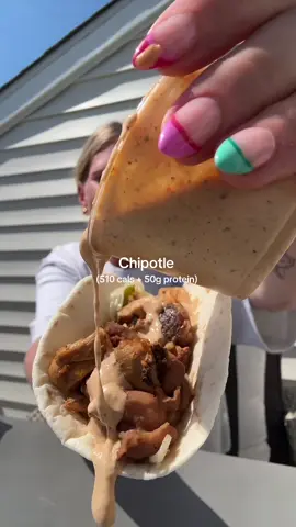 A post by @smallersam_pcos on TikTok caption: Chipotle’s NEW Adobo Ranch🌮 (510 cals + 50g protein) The ranch is a 10/10, baby!! Here’s how to order:  -Burrito bowl with DOUBLE chicken, extra fajita veggies, cheese, and pinto beans- split in half.  -SIDE of Adobo Ranch (110 cals/each)  -2 Mission carb balance 45 cal tortillas.  btw I believe these large containers are 2 “sides” so be careful of that✨ #chipotle #hack #fastfood #order #adobo #ranch #caloriedeficit #protein #mealprep #chicken #healthyrecipes #pcos 
