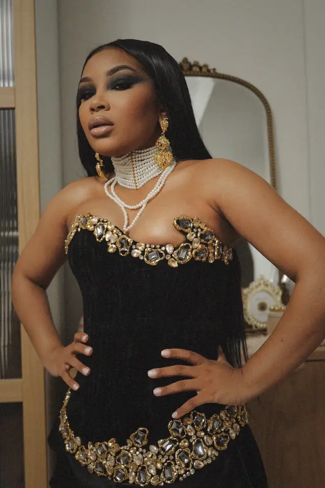 A post by @aaliyahjay on TikTok caption: Draped in grace, adorned in might At thirty-one, she steals the night.  For power like this, so lovely, so rare  Turns whispers to silence, with just a stare. What dost thou see? Speak truthfully  A queen in her prime, undeniably me 👑  6.23 - Thank you for all the bday love xoxo 💋