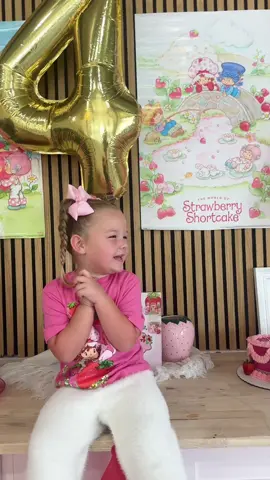A post by @alliahharmon on TikTok caption: Berry Sweet birthday celebration for our girl ❤️ #youngmom #strawberryshortcake 