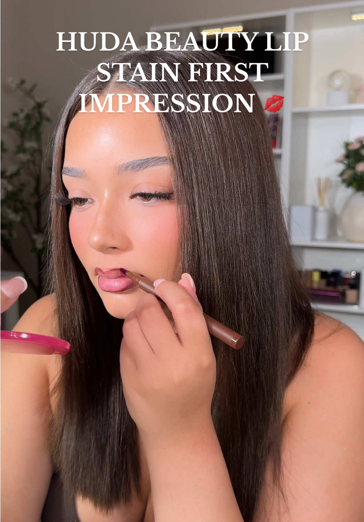 A post by @toriejaden on TikTok caption: these are soooo pretty i love a good lip stain lol! if there are other colors you guys want to see lmk! also will you be buying these? 💋#creatorsearchinsights @Huda Beauty 