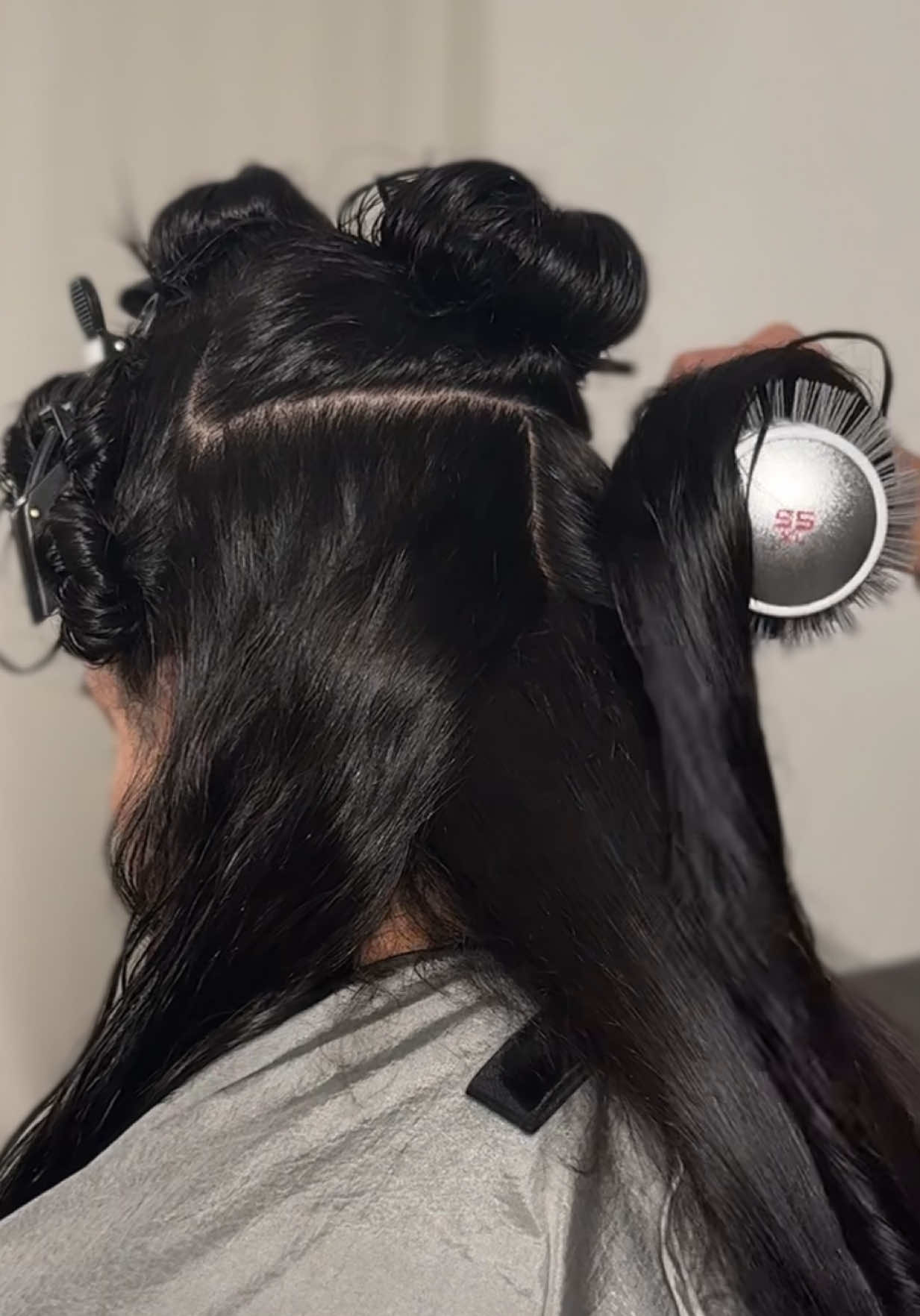 A post by @shir1eygallery on TikTok caption: her hair is so pretty 🦋 gloss + blowout + cut = dreamy ☁️ book in bio July books now open for ATL & NYC  