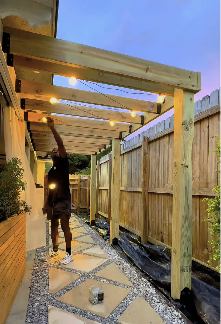 A post by @unclejhonn on TikTok caption: I just transformed this walkway into the area that shines day and night with some help from Govee. #goveeoutdoorlights