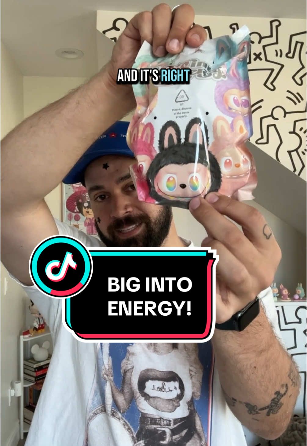 A post by @blakespopnook on TikTok caption: one might say i am biiig into energy! ✨🤍 can’t believe i scored a full case. 🤞🏼 @POP MART US #labubu #bigintoenergy #popmart #blakespopnook #mysterybox 
