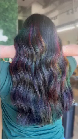 A post by @theresavandamstylist on TikTok caption: #foryoupage #fyp #hairtok #hairstylist #rainbowhair #oilslick #appointments #hairdresser 