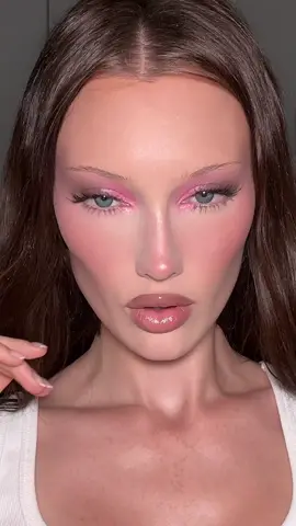 A post by @meredithduxbury on TikTok caption: chocolate strawberry milkshake makeup 🍫🍓