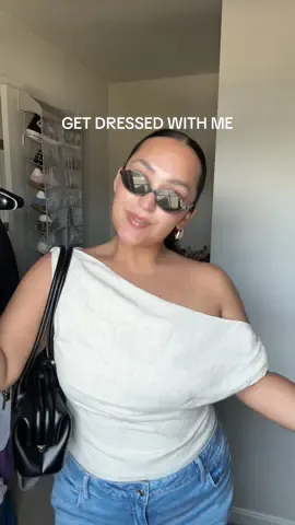 A post by @isa_kristen22 on TikTok caption: get dressed with me 🫶🏼 the shorts turned out CUTEEEE 🥹 outfit details: Jean shorts @American Eagle   top @PEPPERMAYO  flats #hm  bag @OSOI  earrings @Nordstrom Rack  watch @Cartier  bangle @Princess Polly  scent is detour from @noyzfragrance from @Ulta Beauty  sunnies are @Miu Miu  #getdressedwithme #gdwm #wearyourcloset #size12 #curvyfashion #midsizefashion #summeroutfit 