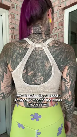 A post by @miss.spider.legs on TikTok caption: This top tho 😮‍💨🤌🏻 I love showing off my back ink!!!  @Kaliroseboutique  #spiderlegs #yallternative #fypシ #relatable #foryoupage #inked #engagement #fyp 