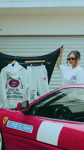 A post by @cassyeungmoney on TikTok caption: Clean up on aisle ate💋 Chef’s Kiss capsule is live Baddie Hotline Zip Up Hoodie  Baddie Hotline Sweatpants (⬆️available as a bundle) Chef’s Kiss Oversized Tee Yes Chef Car Air Freshener (2pk)