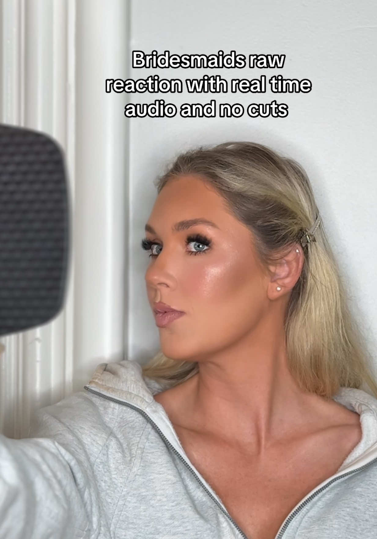 A post by @noelleglammua_ on TikTok caption: It’s so important to showcase real raw reactions from clients when they look in the mirror #bridesmaidmakeup #bridalmakeupartist #clientstories #clientmakeuptutorial 