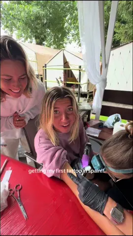 A post by @ajcoastal on TikTok caption: Tattoos at a surf camp in Spain is crazy #tattoo 