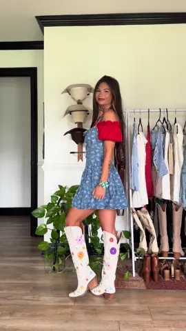 A post by @lorilynngranger on TikTok caption: Fun layering moment! ❤️ dress above my name, “Lori” to save $ on Dingo boots, necklace & red top in my st0refr0nt!