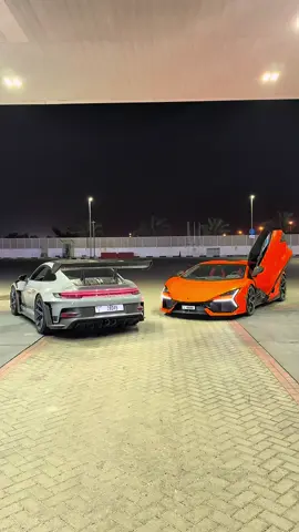 A post by @moses_carss on TikTok caption: 2 bro, 2 supercars 🤩 #revuelto #gt3rs @Nath 