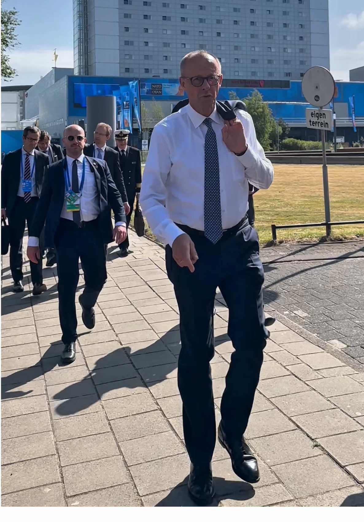 A post by @bundeskanzler on TikTok caption: Writing NATO history ✍️ für Freiheit, Frieden und Sicherheit.  #Bundeskanzler #FriedrichMerz #Nato 