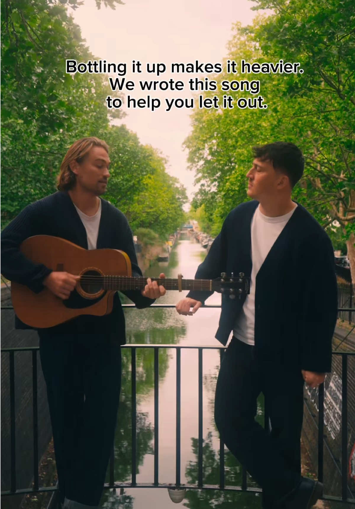 A post by @ on TikTok caption: Bottling it up makes it heavier, @Rhys Lewis and I wrote this song to help you let it out. #MentalHealth #brotherhood #friendship #brothertome #singersongwriter 