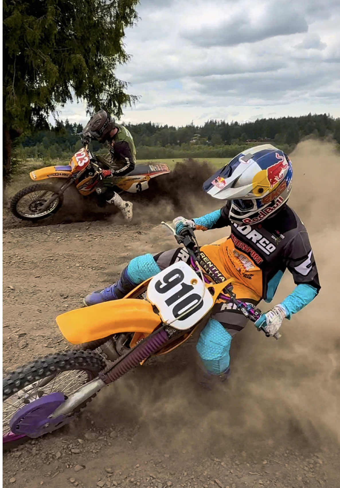 A post by @carsonbrown_910 on TikTok caption: Keeping the 1996 KTM 300MXC tapped while @lordlugnutz lets his 1996 250EXC shred at The Kelley Farm 🤠 Which one of these bike would you pick to ride? Yes my head gasket was blown at the end making it smoke white 😂😭 @Red Bull Motorsports @Red Bull @MotoSport.com @All Balls Racing #KTM #300MXC #250EXC 🎥: @Charlie McDermott Hale 