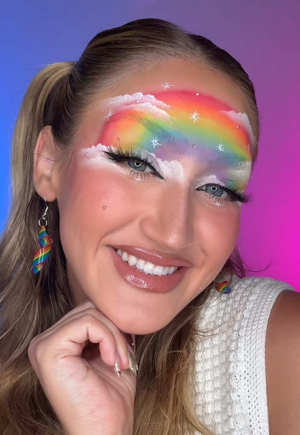 A post by @katiefarhood on TikTok caption: IMAGINATION 😀🌈 ib @Mei Pang #makeupartist #makeuptutorial #rainbowmakeup #pridemakeup #rainbowmakeuplook 
