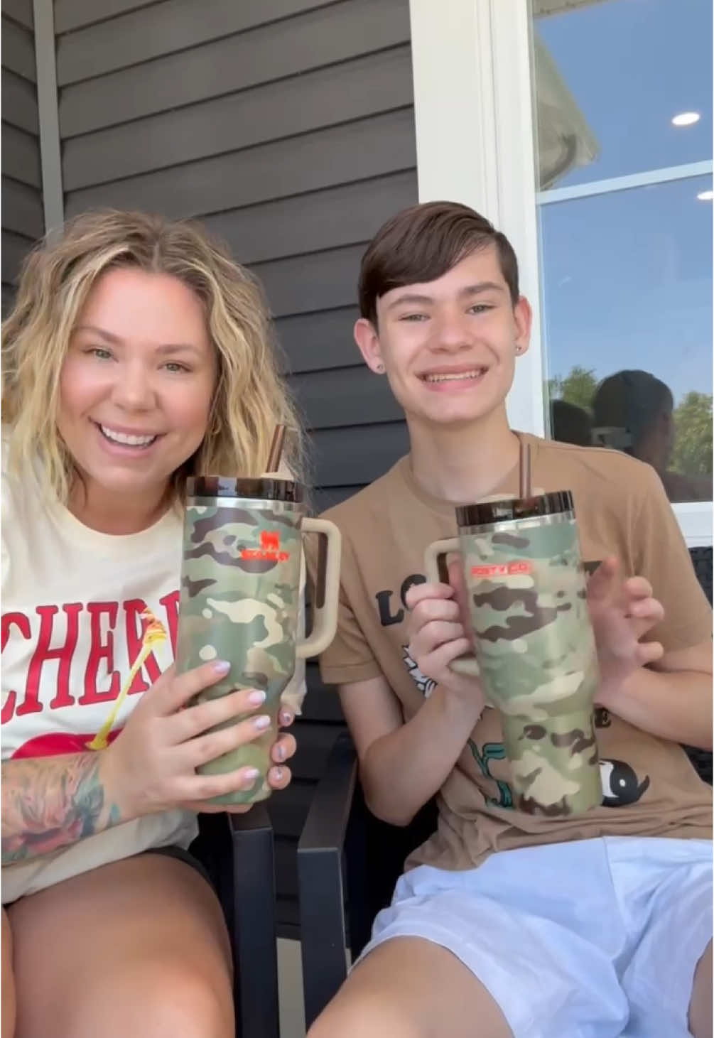 A post by @kaillowry on TikTok caption: @Post Malone @Stanley Brand unboxing with @Isaac Elliott Rivera 🤠🧡 #unboxingvideo #stanleyunboxing #postmalone 