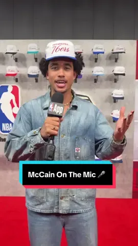 A post by @nba on TikTok caption: @Jared McCain is on the carpet and on the mic 🎤 Catching up with this year’s draftees in style, thanks to @neweracap. Tune into the #NBADraft presented by State Farm TONIGHT, 8:00pm/et on ABC & ESPN 🏀 #NBA  #Basketball 