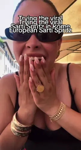 A post by @cierraramirezofficial on TikTok caption: Forever an aperol girly…but uh oh there’s a new gal in town ;) #sartispritz #rome #italy 