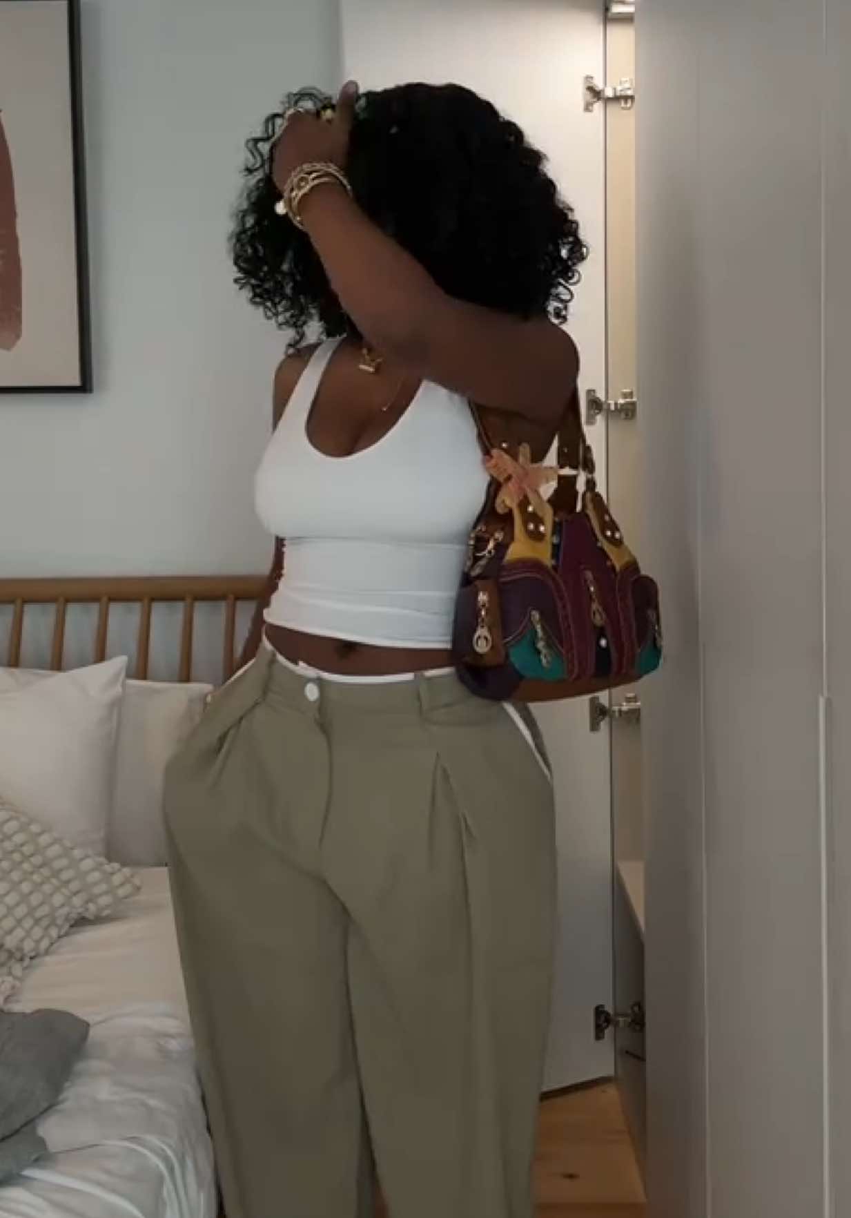 A post by @hbelllla on TikTok caption: saved the best for last 🫧🧋 item names: Don't Prove I'm Right Camo Barrel Pant - Olive/combo Charmed I'm Sure Printed Wide Leg Jeans - Medium Wash Thinking Of You Trouser Pant - Sage Sol Printed Baggy Jeans - Teal/combo #tanktops #summeroutfits 