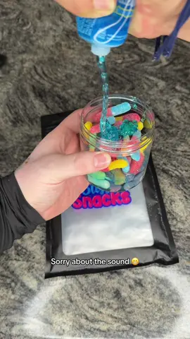A post by @bussinsnacks on TikTok caption: Don’t Focus on the Sound The Oozee Tube Makes 😬 #BussinSnacks #gooey #candy #gummies #candyshop 