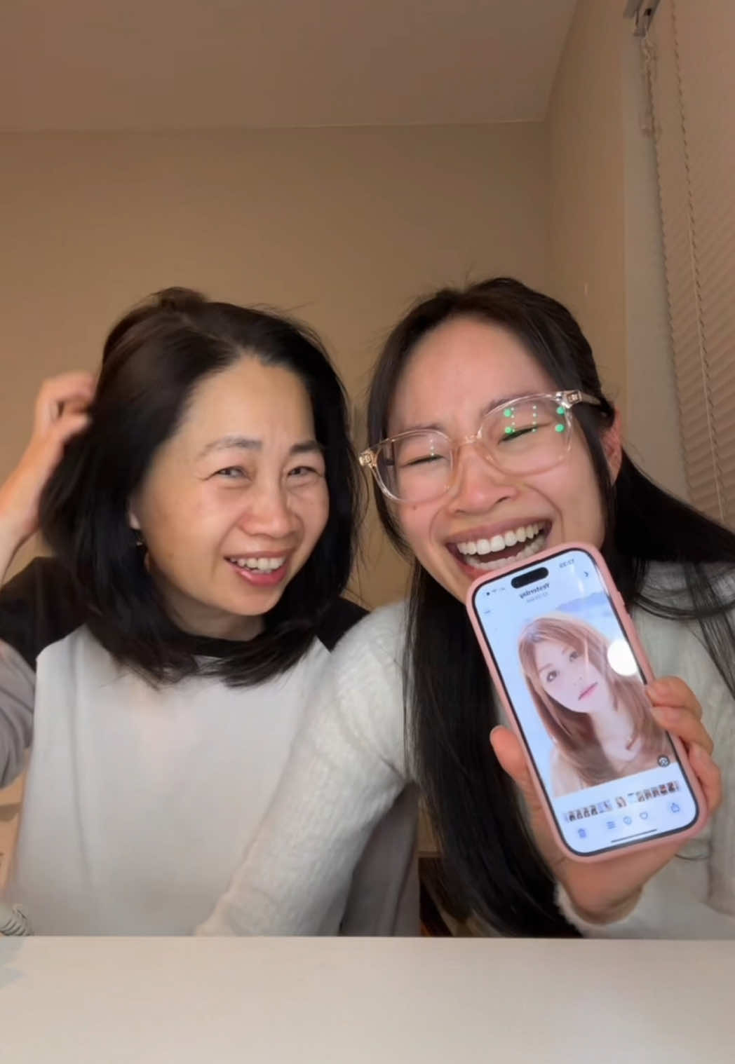 A post by @lizzymwong on TikTok caption: I can’t even be mad about my haircut bc my mom’s is so much worse 😭 #badhaircut #ihateit #haircut #stylinghair #badhairday 