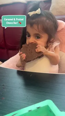 A post by @ourlittlemms on TikTok caption: My little foodies taste testing this Twisted Caramel Stuffed Chocolate Bar!😋🍫@CHOCBOX ✨ #chocbox #chocolate #chocolatebar #sweet #food #foodie #asmr #mukbang #twins #eating #kids #yum #yummy #cute #viral #foodlover #funny 