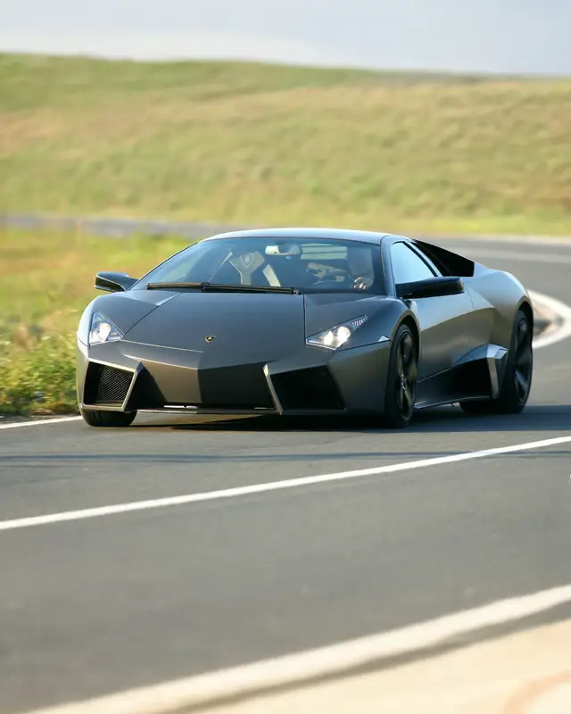 A post by @lamborghini on TikTok caption: Reventón: the first ever Lamborghini few-off equipped with a 650-horsepower naturally aspirated engine. A true masterpiece. #Lamborghini