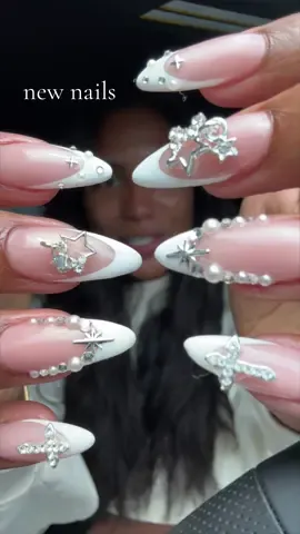 A post by @monetmcmichael on TikTok caption: no my nail tech went so crazy on this set that i have butterflies lmao 😮‍💨😮‍💨💕💅🏽 what’s ur go to set ?? im def an almond french girlie 💅🏽 i wanna try red soon lowkey 