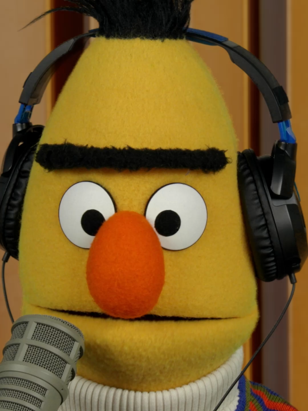 A post by @sesamestreet on TikTok caption: Grab your headphones, this podcast is cereal-ously raising the bar and bowl! 🥣💛🧡🎙️