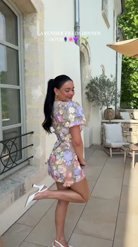 A post by @kaelimaee on TikTok caption: this is my favorite dress i’ve ever worn THE FLOWERSSSS🌸🪻💜🌱🌾✨ #france #europe #OOTD #europeoutfits #outfitinspo #fitcheck #OOTD #eurosummer #fyp #viral #lavendarfields #loccitane 