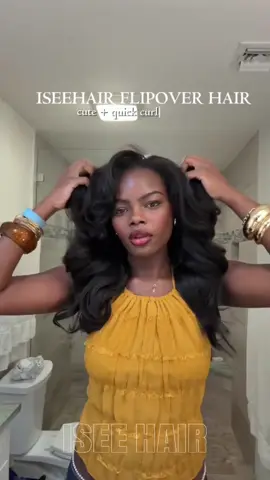 A post by @iseehairbeauty on TikTok caption: From wavy hair to curly hair is just that easy! 😉👏🏽 this half wig is such a magic!  Kinky curly 22” Wear Go Half Wig  #iseehairbeauty #iseeweargowig #iseehalfwig #kinkycurly #fy #gluelesswig #flipover 