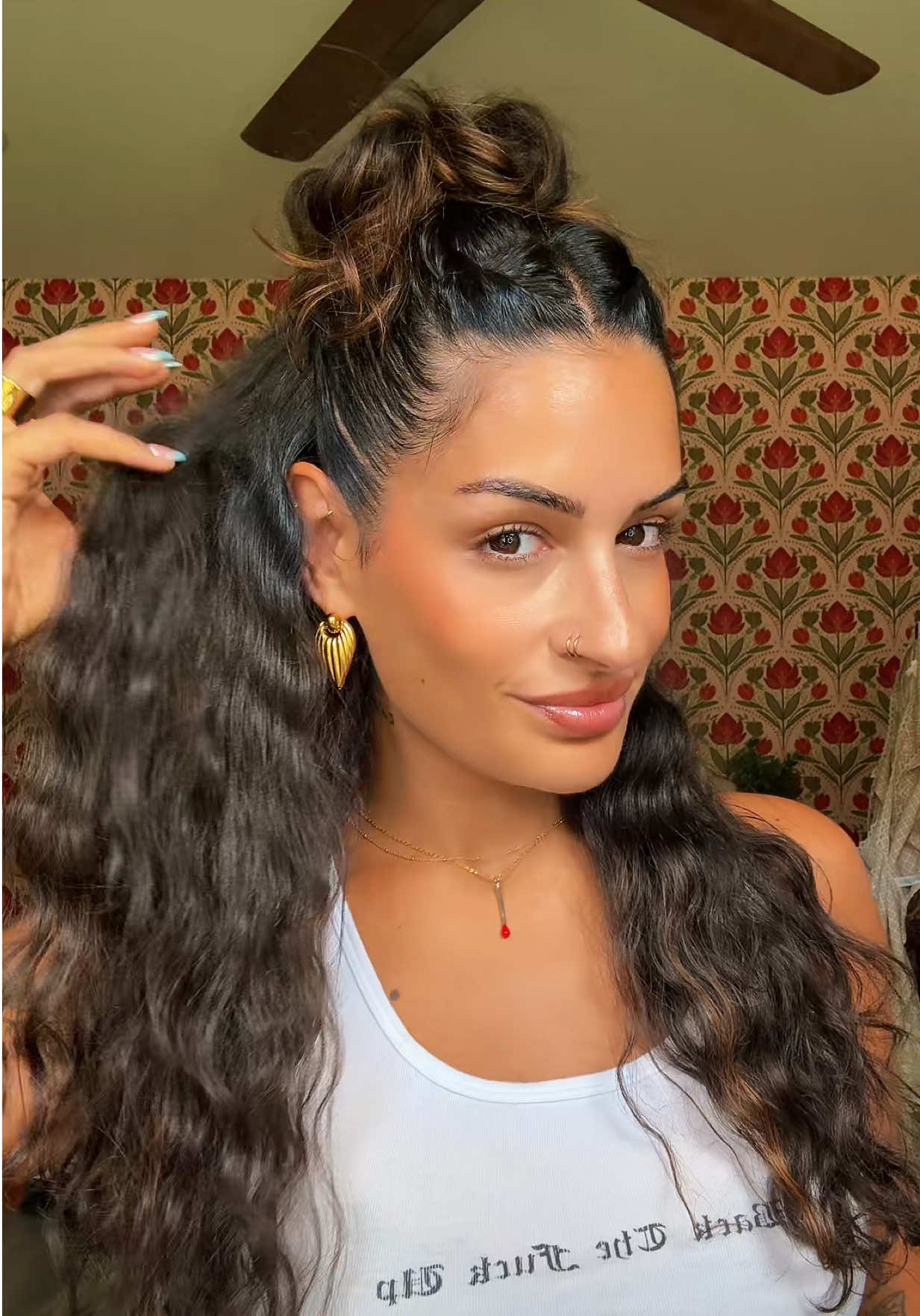 A post by @madeandtaylored on TikTok caption: The perfect half up style doesn’t exi…. YES IT DOES QUEEN #hairtok #hairvideo #hairtutorial #halfuphalfdown #madeandtaylored 