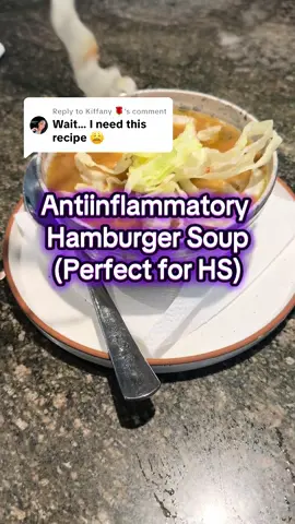 A post by @cristina_maria_curp on TikTok caption: Replying to @Kiffany 🌹 recipe for a antiinflammatory soup-  I also have my full presentation on wound healing foods on my site- Ingredients: 2 tablespoons avocado oil 1 small onion, diced 2 sticks celery, diced 2 cloves garlic, minced 1 pound 90% lean ground beef 1 teaspoon fine salt 1 teaspoon dried parsley 1 teaspoon garlic powder ½ teaspoon dried oregano 2 tablespoons paleo mayo 2 tablespoons Dijon mustard 1-2 tablespoons Worcestershire sauce  3 cups bone broth 2 tablespoons dill pickle brine (optional) To garnish and optional:  Sliced pickles Crispy bacon Shredded lettuce Instructions 1. Heat a large pot over medium heat. Add in the cooking oil. 2. When it comes to temperature add in the onion, celery and garlic. 3. Sauté until softened and aromatic, about 8 minutes. 4. Crumble in the ground beef and the seasoning, breaking up and stirring with a whisk. 5. Cook, stirring often until browned, about 8 minutes. 6. Mix in the mayo and the mustard until creamy. Mix in Worcestershire sauce if using. 7. Then add in the broth and brine. Stir well then cover. Simmer for 20 minutes. 8. Open the lid and bring to a boil, stirring often for 5 minutes. Take it off the heat. 9. Serve hot! Add toppings and garnishes if desired.