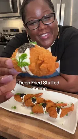 A post by @its_sogood on TikTok caption: Deep Fried Crab Stuffed Shrimp @BleuKitchen My Guy!🙏🏾             8oz Jumbo lump crabmeat 1 egg yolk 1-2 tsp Yellow mustard  1-2 tsp Dijon mustard  4- 5 crushed @Club Crackers  1/2 tbs Worcestershire sauce 1-2 tsp @OLD BAY Seasoning  Few splashes hot sauce Wet batter: 1 cup all-purpose flour  1 tbs Tony’s no salt seasoning  1/2 tbs Old bay seasoning  2 eggs  Club soda (no measurement. Batter should be thin) Other: 12 shrimp (size 13/15) Crushed club crackers  #food #stuffedshrimp #EasyRecipe #homemade #foodtiktok #fyp 