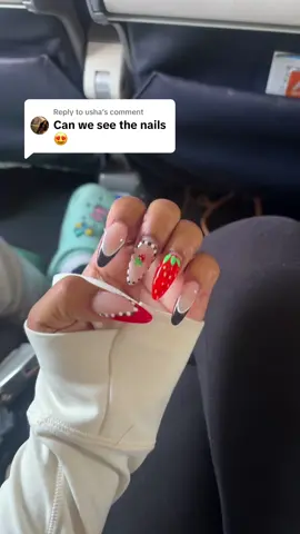 A post by @kaurynjay on TikTok caption: Replying to @usha up close & personal. Excuse me that I’m still on a flight, haha. 🍓♥️💅 #nail #nails #naildesigns #kaurynjay #nursebaddiekj 