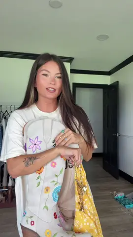 A post by @lorilynngranger on TikTok caption: A lot of flowers going on here but I’m not mad about it hehe 🌸💐🌼 LORI to save on all Dingo boots! Everything else in my ltk! 