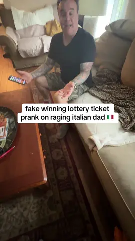 A post by @theragingitalian on TikTok caption: pops is NOT a winner today 😭💀 #foryoupage #foryou #fyp #fypp #fy #viral #rage #funny #raging #italian #dad #fypage #theragingitalian #prank #fake #fakeaudio #fakebody #trending #trend #joke #lotteryprank #lotteryticket 