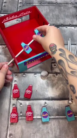 A post by @mrs.fallout on TikTok caption: Crafting a Fallout Tabletop Nuka Cola Foosball Game #crafting #fallout #mrsfallout #fallouttok 
