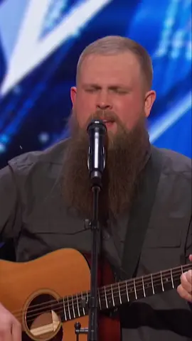 A post by @agt on TikTok caption: Replying to @Boston Terrier mama Bill Taylor takes on the Bob Dylan classic "Knockin' on Heaven's Door". #AGT | @NBC and Peacock