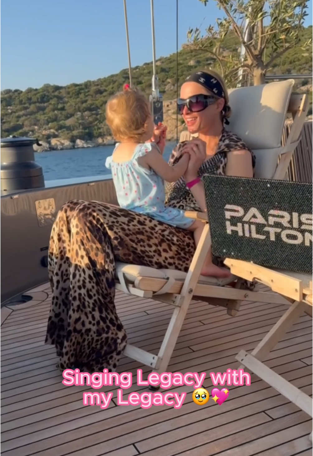 A post by @parishilton on TikTok caption: Vibing to the Legacy Remix from Infinite Icon: The Remixes all Summer long 💖🔥 Remember, for every post using my Remixes I’ll donate $11 to @RainbowRailroad to support the LGBTQI+ community this June! 🏳️‍🌈 We’ve already raised over $70,000 together, but I still need your help to reach our goal of $111,000! ✨