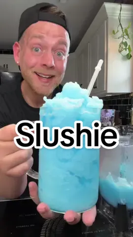A post by @kitchentool on TikTok caption: Gas station slushie? But make it homemade. Just 3 ingredients and a few minutes and yes it tastes exactly like the ones you used to beg for at 7-Eleven. What flavor should I do next? 👇 #CoolOffTreats #homemadeslushie #slushie #slushy #icy #drink #SummerTreats #FrozenDrinks #TikTokEats #blueraspberry #blue #raspberry #blueslushie #SlushieHack #EasyRecipes #try #fyp 