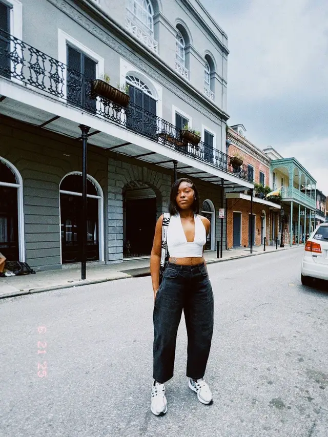 A post by @kennedyjack18 on TikTok caption: Me in NOLA in front of the LaLaurie mansion ⚜️ #fyp #foryoupage #Tatcha #lalauriehouse #NOLA #blackgirlluxury #travel #neworleans 