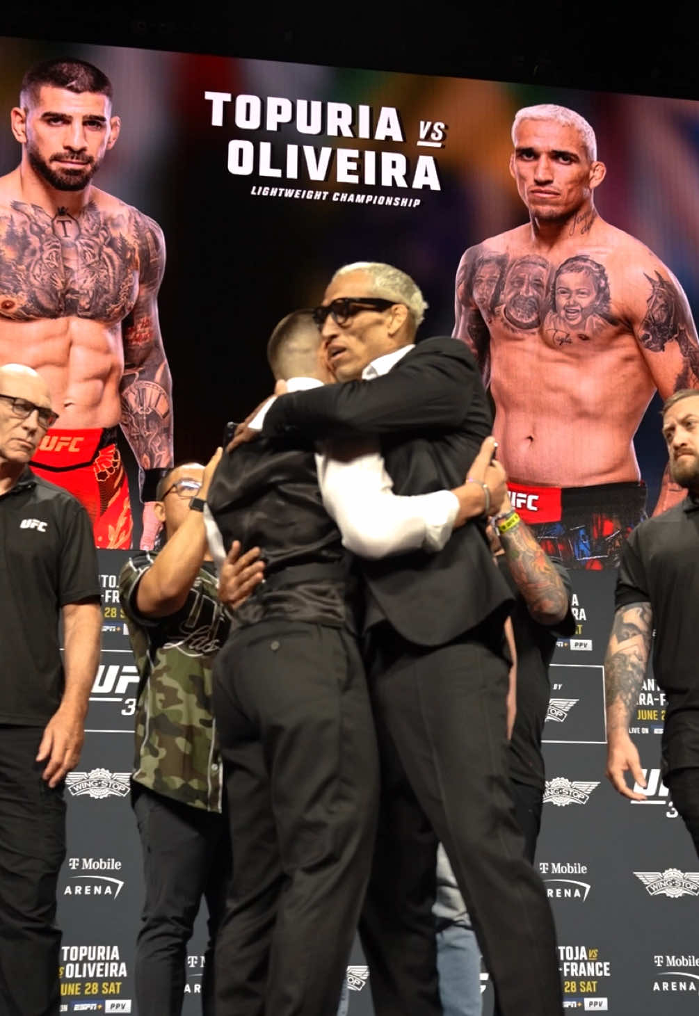 A post by @ufceurasia on TikTok caption: 🤝 Только уважение! #UFC #MMA #UFC317 #facetoface #topuria #oliveira #staredown #respect #viral 