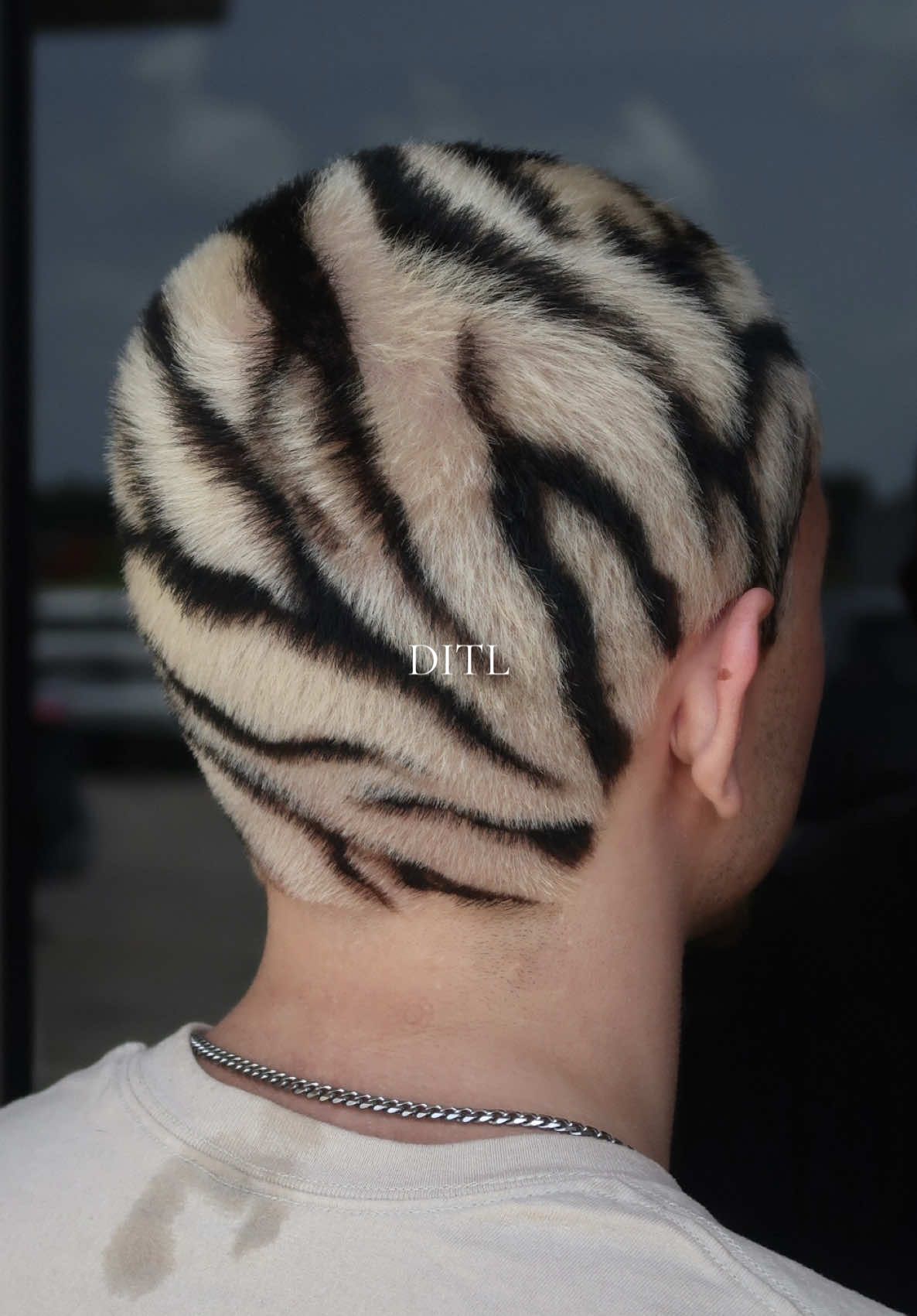 A post by @feltsmallie on TikTok caption: a fun day for sure! #ditl #worklife #hairstylist #buzzcut 